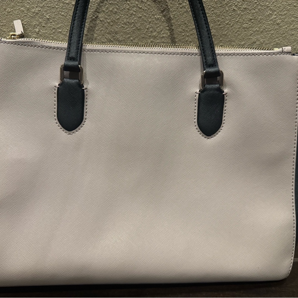 Elegant Cream Tote Bag with Black Handles